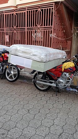 New beds delivered the Haitian way